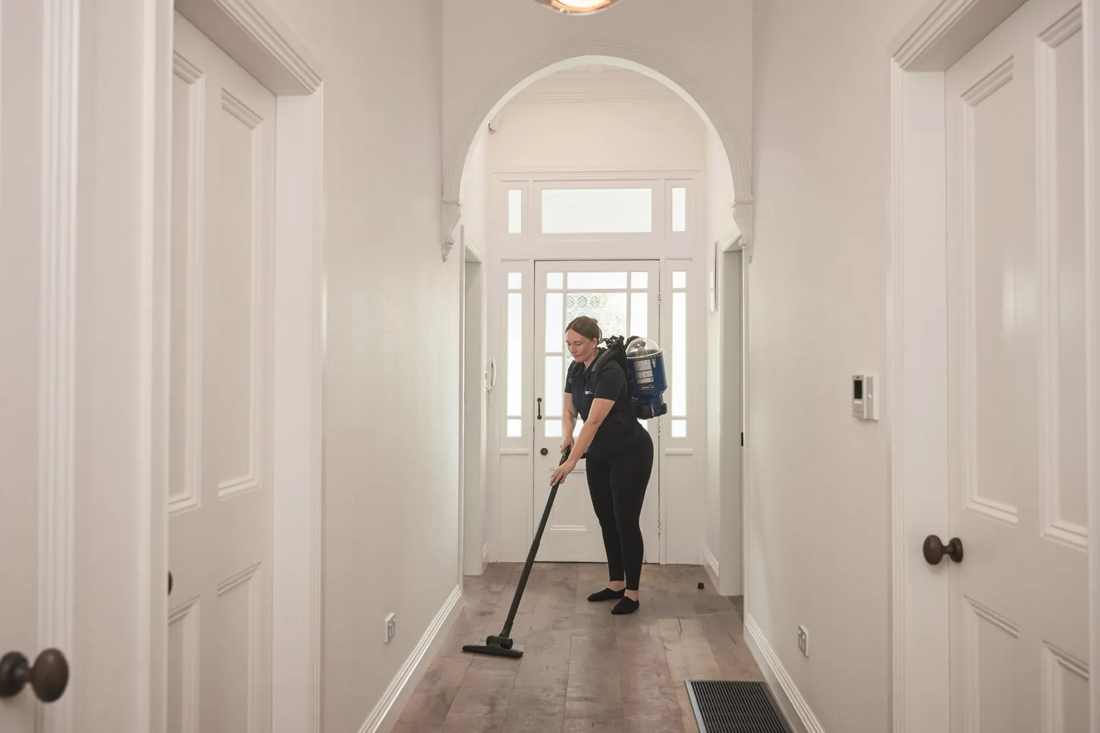 A Spruce cleaner working in a NZ home