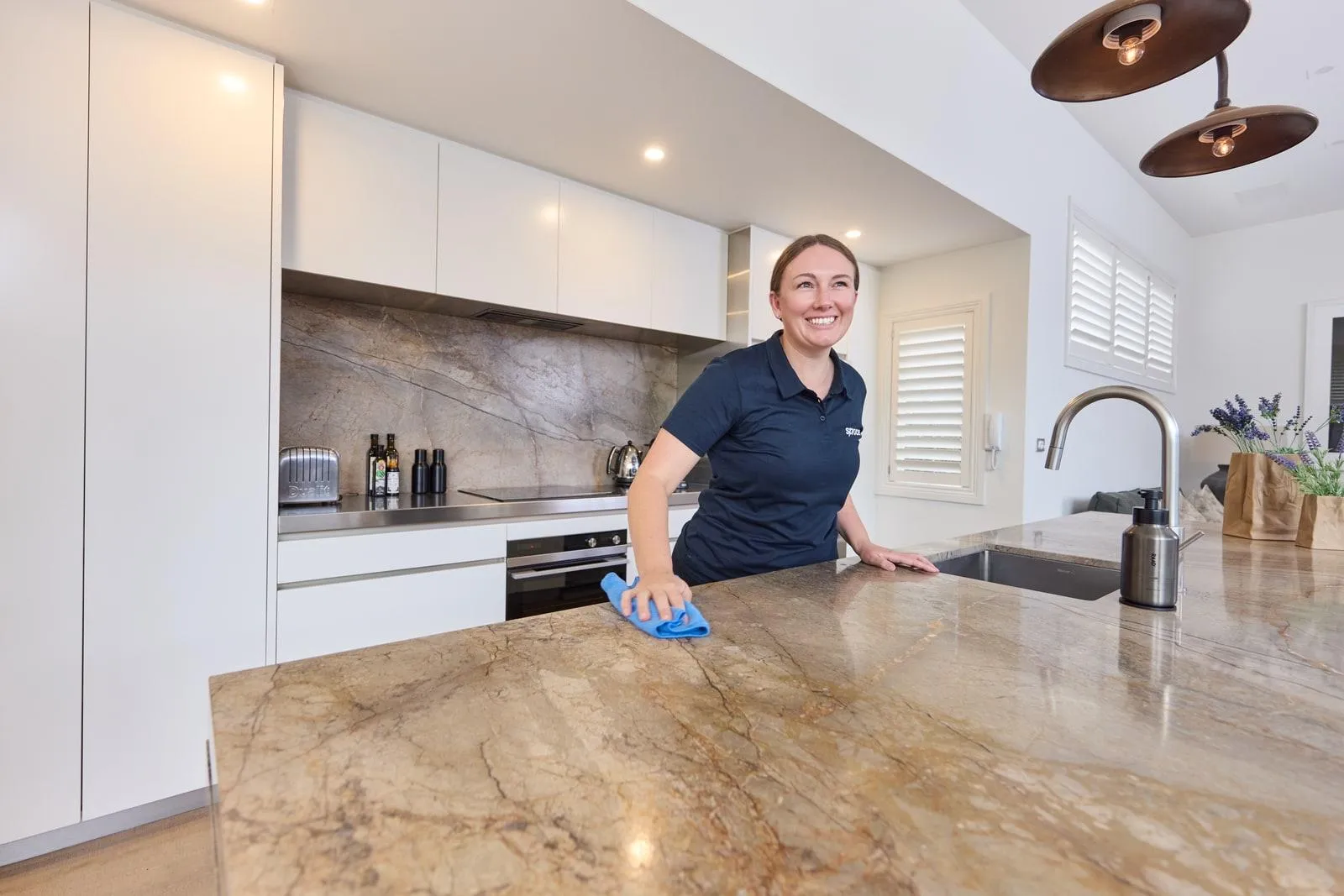 A Spruce cleaner at work in a Hamilton home
